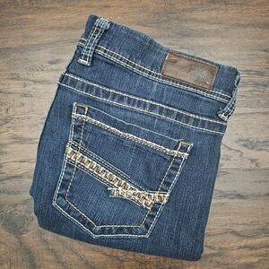 BKE Women's Boot Cut Jeans in Blue with Brown Patch